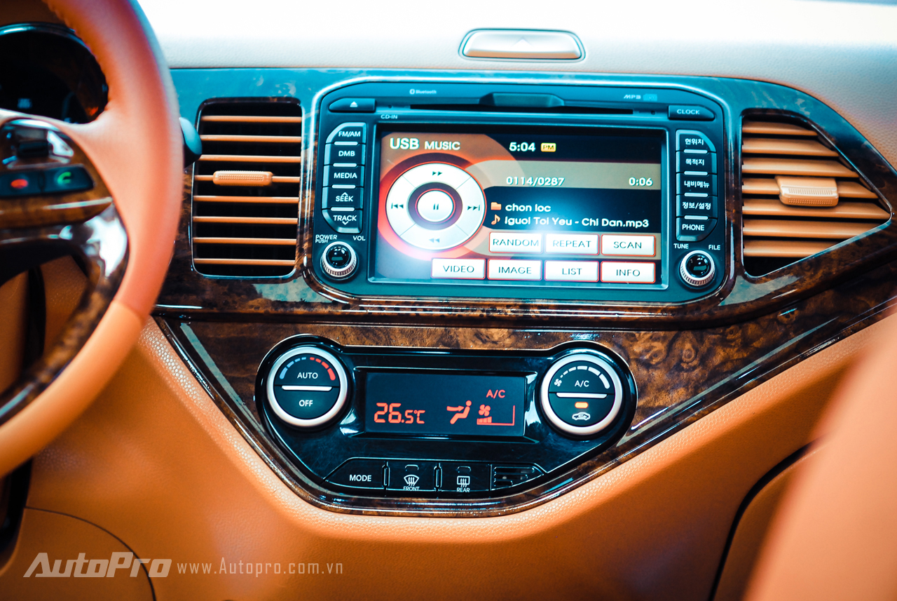 ... or the hand brake in this Kia Morning car is also changed to wood trim.