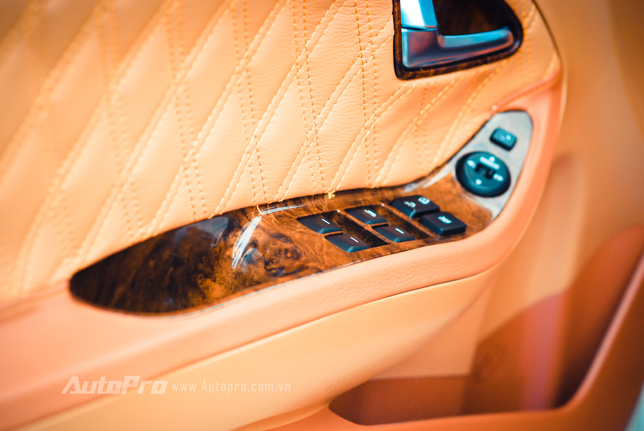 The armrests are also covered in wood trim.