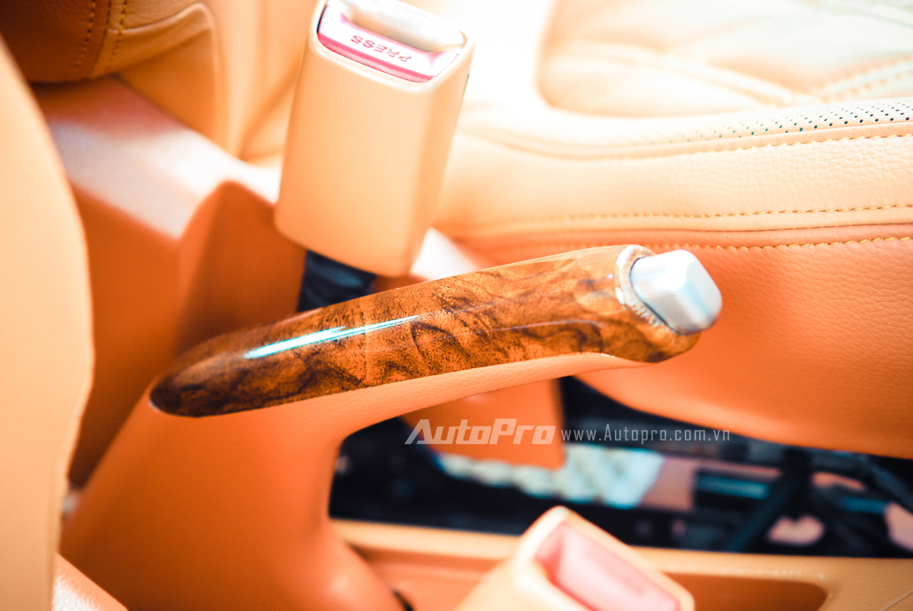 ... or the hand brake in this Kia Morning car is also changed to wood trim.