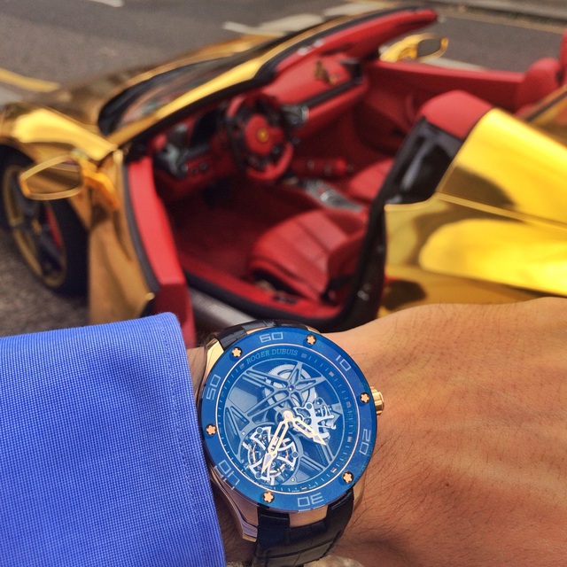 C:\Users\SONY GIANG VO\Desktop\Cars and watches\roger-dubuis-gold-ferrari-458-spider.jpeg