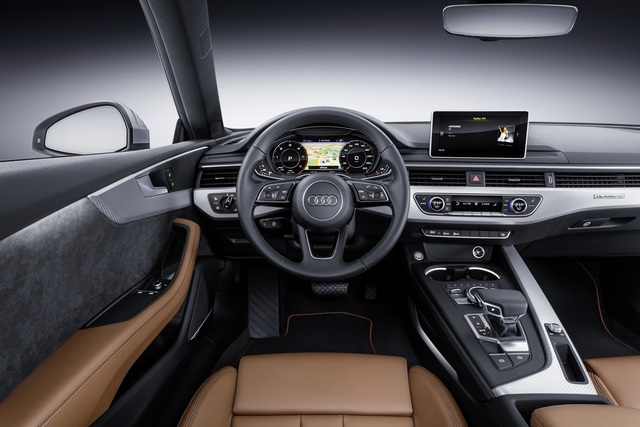
Bên trong Audi A5 Coupe thế hệ mới có những điểm nhấn như hệ thống điều hòa không khí tự động 3 vùng, ghế trước chỉnh điện 8 hướng, cửa sổ trời toàn cảnh, hệ thống đèn viền dạng LED với cài đặt 30 màu, bộ phụ kiện bằng nhôm cùng bệ tì tay trung tâm ghế trước có thể gập, trượt và tùy chỉnh độ cao.
