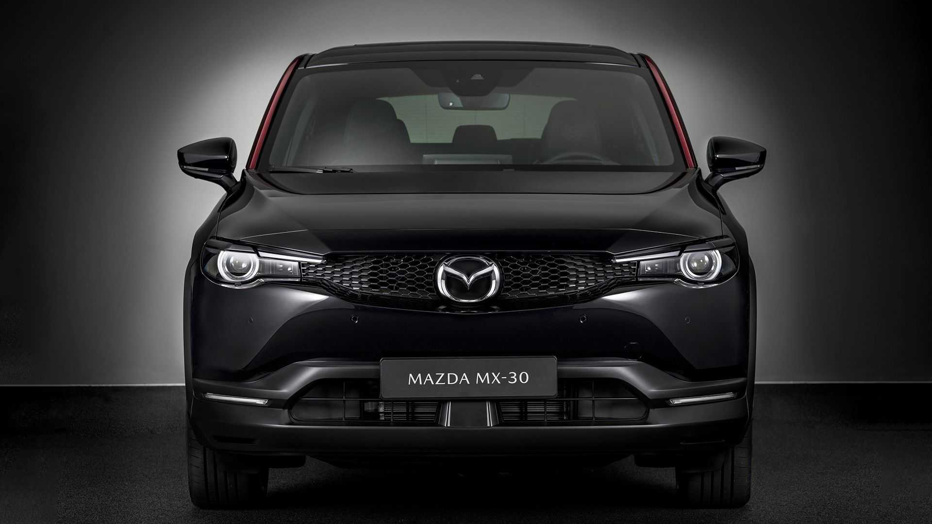 Mazda MX-30 - SUV nhỏ tận dụng động cơ xoay, chạy hơn 600km mới phải sạc - Ảnh 3.