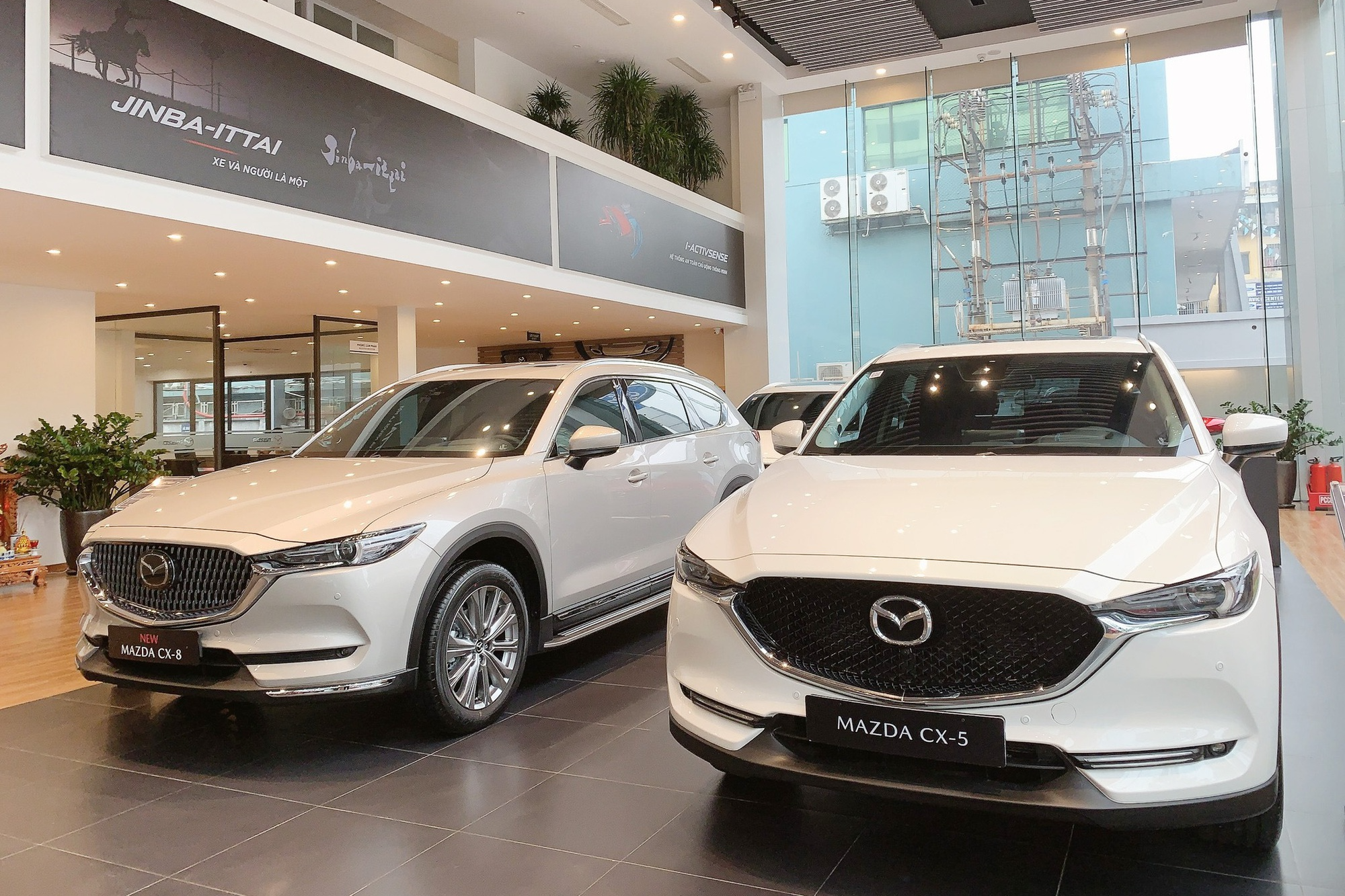 Mazda, Kia, Peugeot giảm giá loạt xe, người Việt có thể ‘bắt đáy’ mới nhiều dòng sản phẩm - Ảnh 1.