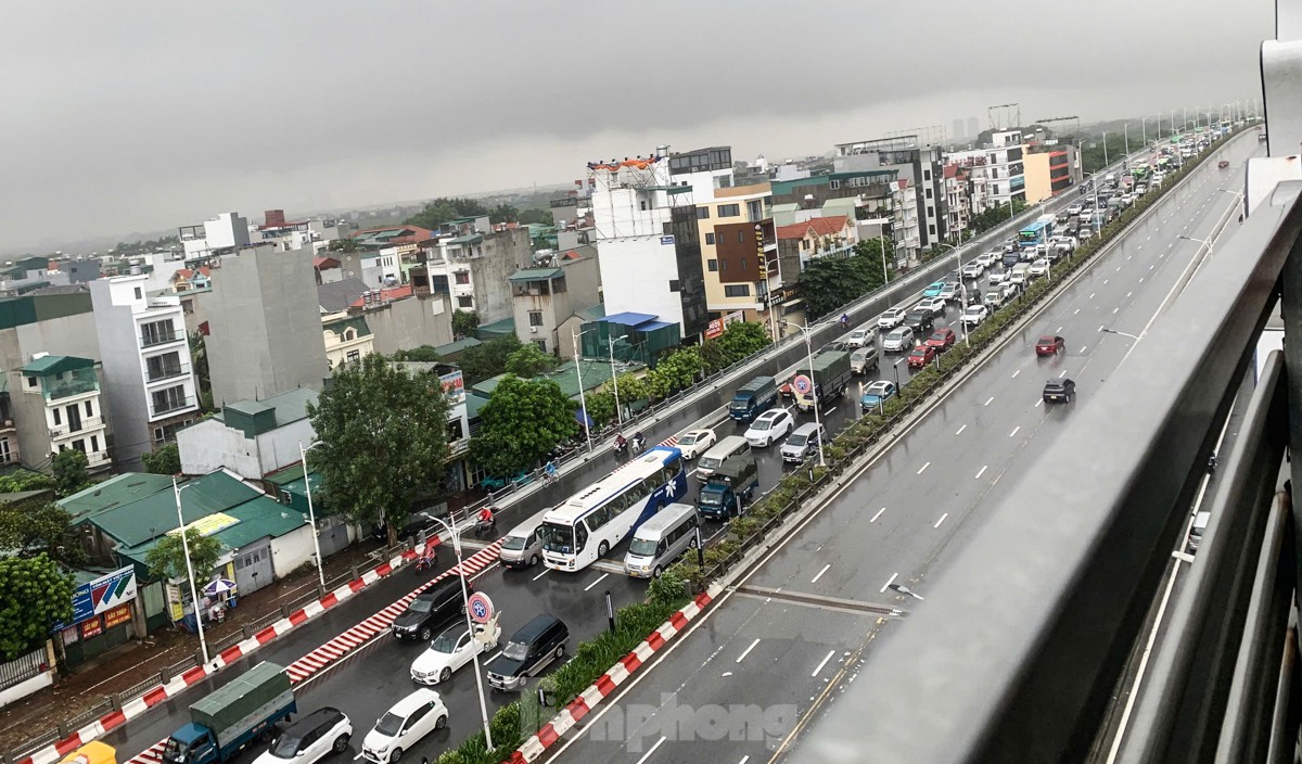 Lũ trên sông Hồng tại Hà Nội đã đạt đỉnh và ngừng dâng, dưới báo động 3- Ảnh 6.