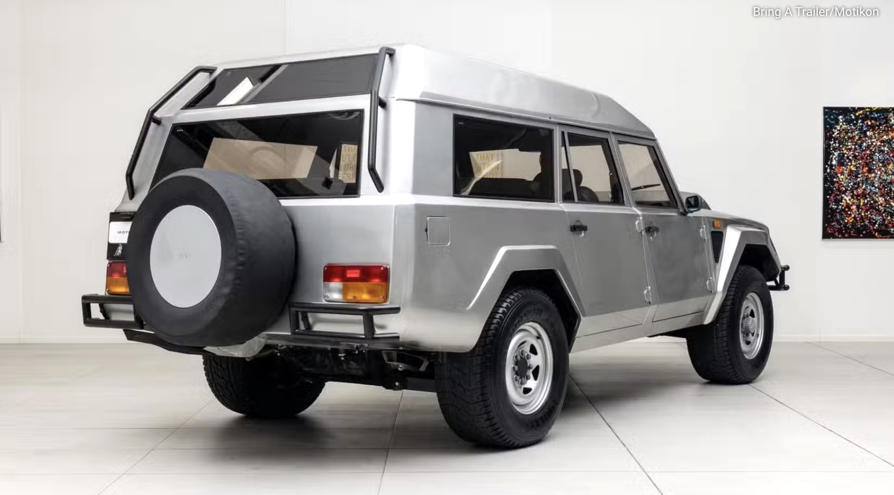 Xe Lamborghini 'siêu dị' từng thuộc về quốc vương Brunei lên sàn đấu giá: Động cơ V12, số sàn, 10 chỗ ngồi, độc nhất trên thế giới- Ảnh 2. Xe Lamborghini 'siêu dị' từng thuộc về quốc vương Brunei lên sàn đấu giá: Động cơ V12, số sàn, 10 chỗ ngồi, độc nhất trên thế giới- Ảnh 2.