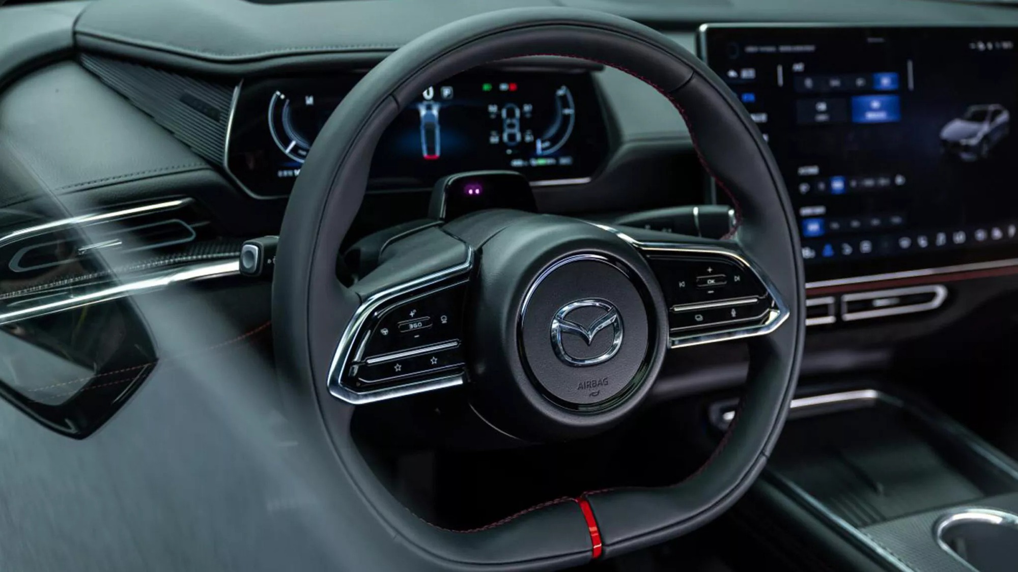 Mazda 6e có bản thể thao: Mâm đen bóng, cùm phanh đỏ, vô-lăng có chi tiết giống xe đua, ghế bọc Alcantara, động cơ không đổi- Ảnh 11. Mazda 6e có bản thể thao: Mâm đen bóng, cùm phanh đỏ, vô-lăng có chi tiết giống xe đua, ghế bọc Alcantara, động cơ không đổi- Ảnh 11.