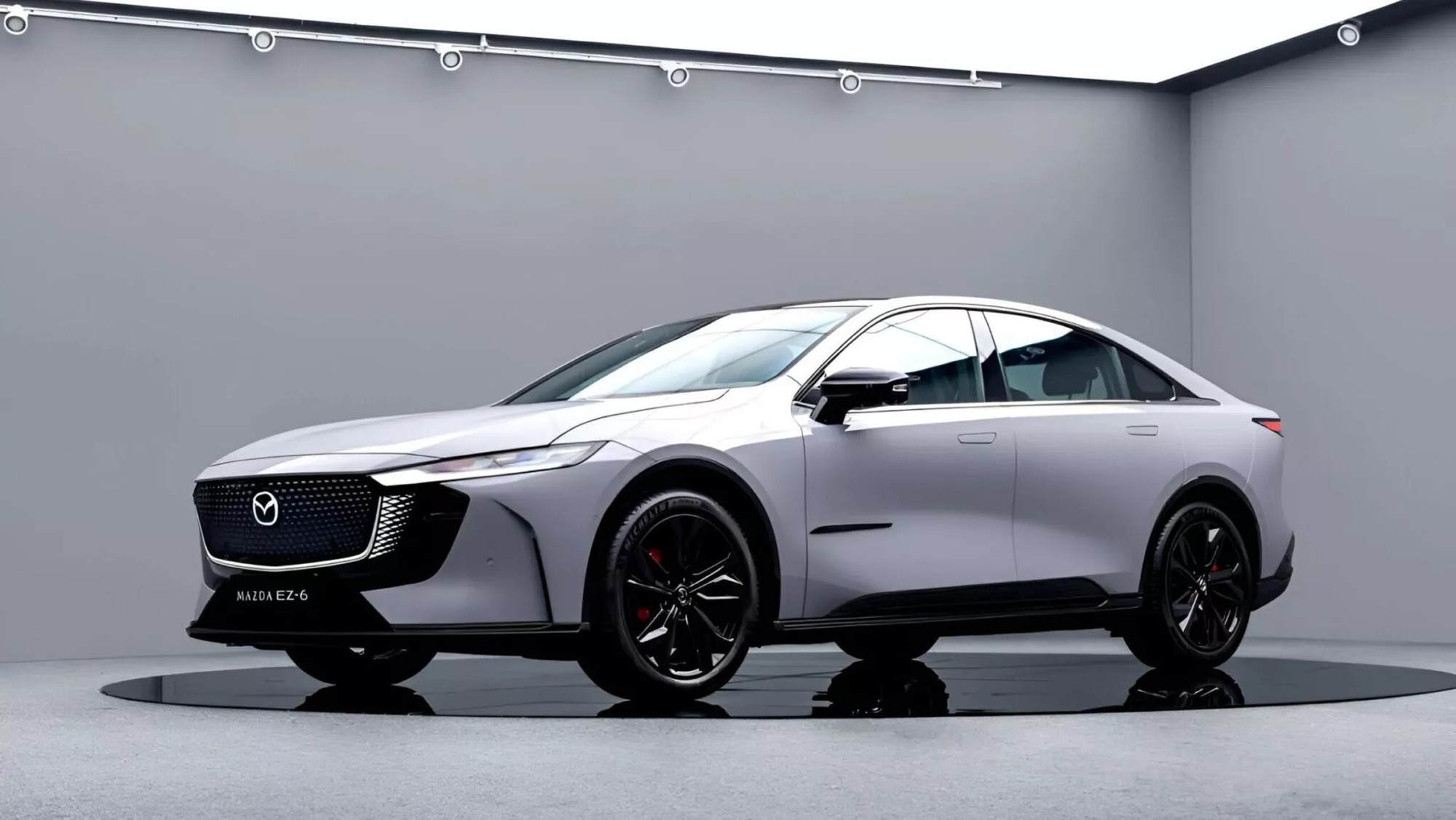 Mazda 6e có bản thể thao: Mâm đen bóng, cùm phanh đỏ, vô-lăng có chi tiết giống xe đua, ghế bọc Alcantara, động cơ không đổi- Ảnh 5. Mazda 6e có bản thể thao: Mâm đen bóng, cùm phanh đỏ, vô-lăng có chi tiết giống xe đua, ghế bọc Alcantara, động cơ không đổi- Ảnh 5.