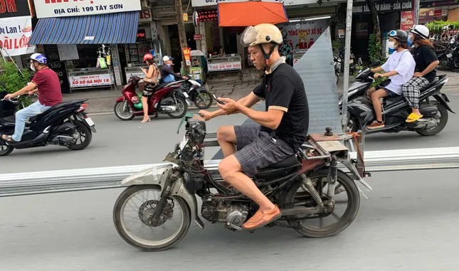 Xe máy không đạt kiểm định khí thải có bị loại bỏ ngay?- Ảnh 1.