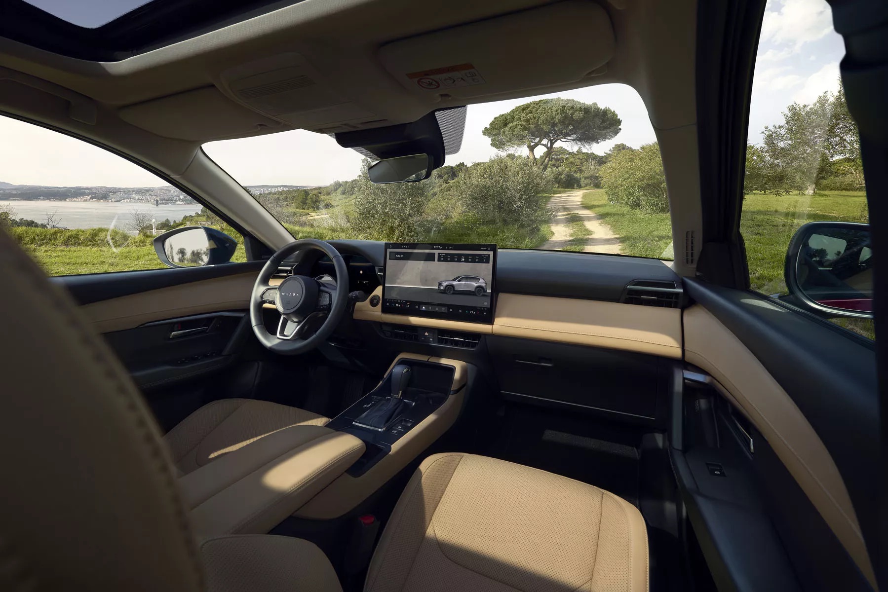 Mazda CX-5 2025 ra mắt: Nội thất mới hoàn toàn, màn hình lớn, ít phím bấm, 'úp mở' bản hybrid gây bất ngờ- Ảnh 4. Mazda CX-5 2025 ra mắt: Nội thất mới hoàn toàn, màn hình lớn, ít phím bấm, 'úp mở' bản hybrid gây bất ngờ- Ảnh 4.