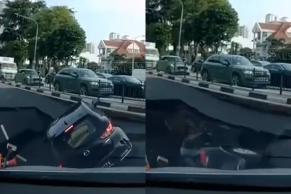 Mặt đường đột ngột sụt xuống, ô tô rơi xuống hố tử thần chỉ 5 giây- Ảnh 1.