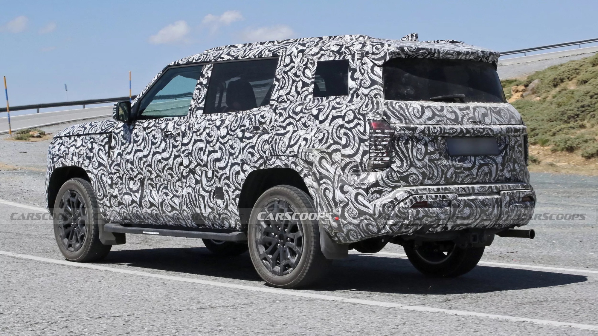 Mitsubishi tung video 'thả thính' SUV lạ: Dáng của Pajero, đèn như Xforce, sẽ đấu Land Cruiser Prado- Ảnh 5. Mitsubishi tung video 'thả thính' SUV lạ: Dáng của Pajero, đèn như Xforce, sẽ đấu Land Cruiser Prado- Ảnh 5.