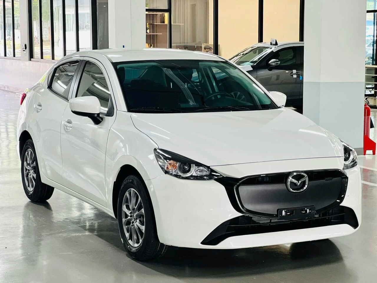 Mazda2 giá chưa đến 400 triệu, thực tế tại đại lý có thể còn thấp hơn - Ảnh 1.