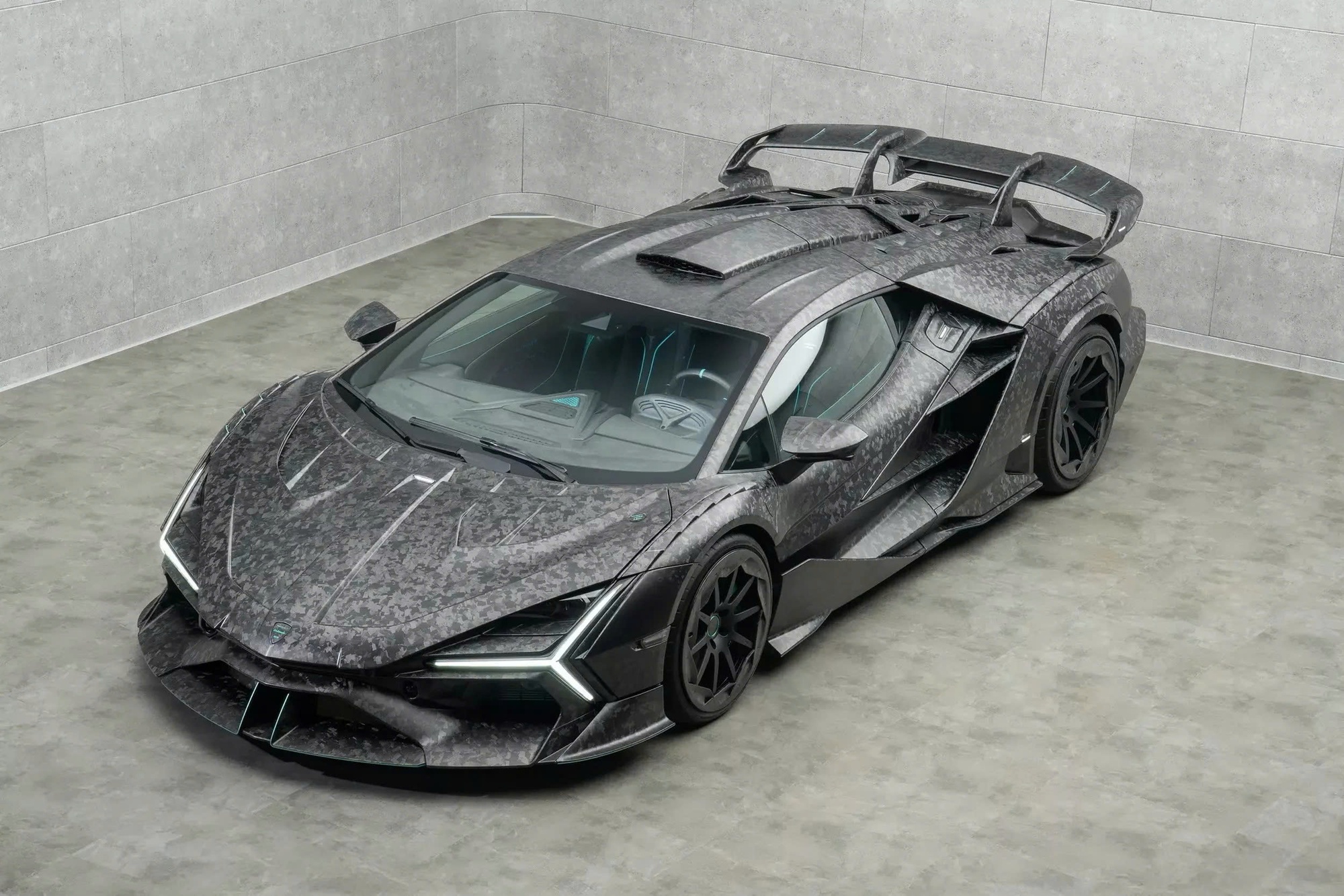 Chủ siêu xe Lamborghini Revuelto ở Việt Nam có thể tham khảo bản độ 'cực ngầu' này: Thân xe carbon toàn bộ, sức mạnh tăng thêm gần 100 mã lực- Ảnh 1. Chủ siêu xe Lamborghini Revuelto ở Việt Nam có thể tham khảo bản độ 'cực ngầu' này: Thân xe carbon toàn bộ, sức mạnh tăng thêm gần 100 mã lực- Ảnh 1.