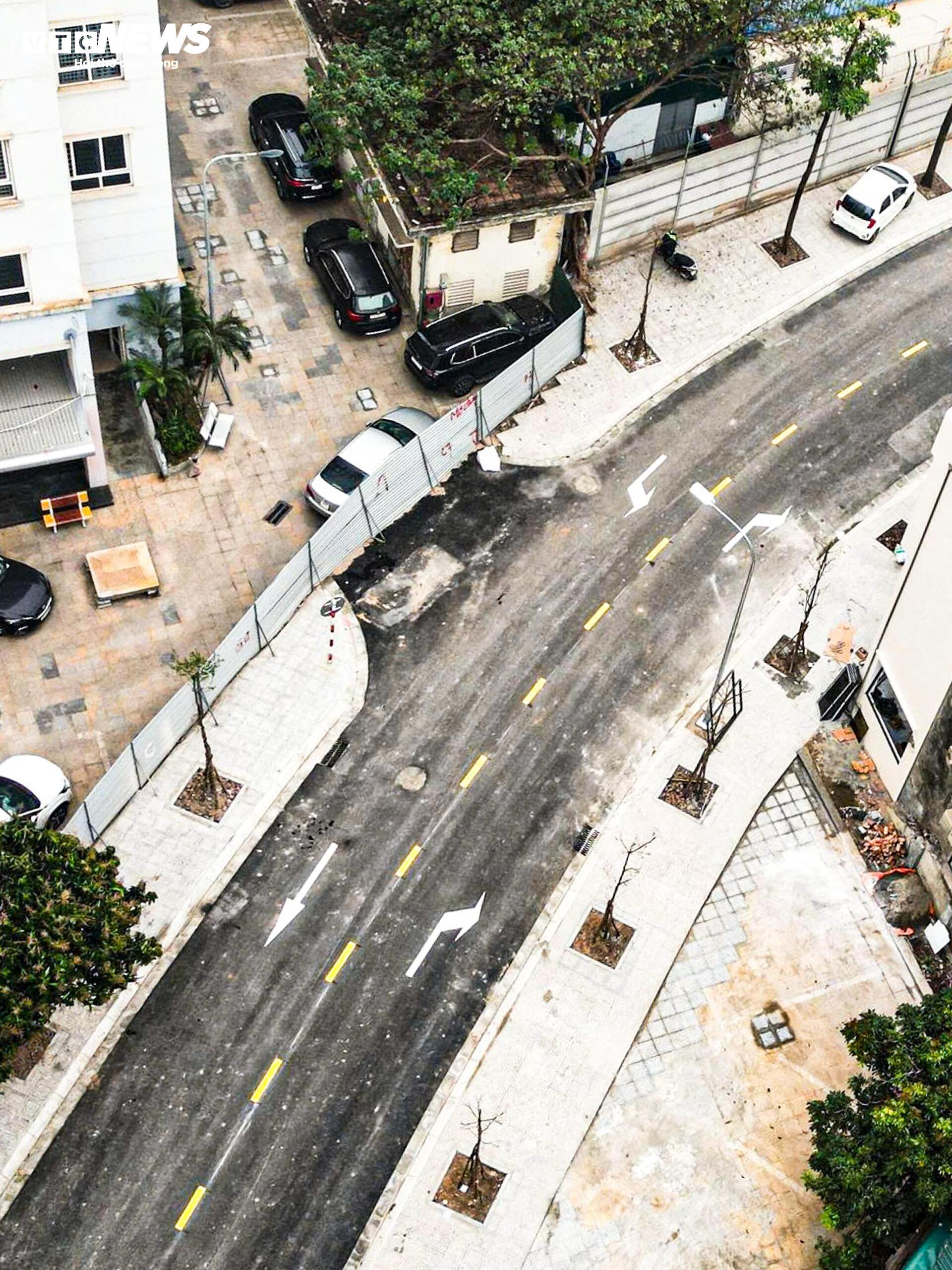 To&agrave;n cảnh tuyến đường hơn 83 tỷ vừa th&ocirc;ng xe kỹ thuật, l&aacute;ch giữa 2 t&ograve;a chung cư- Ảnh 6.