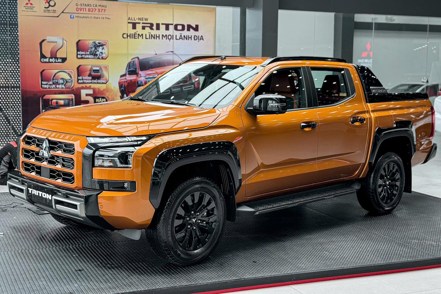 Mua xe Mitsubishi th&aacute;ng n&agrave;y đỡ tới gần 80 triệu đồng ph&iacute; lăn b&aacute;nh: Triton khuyến m&atilde;i khủng nhất, Xpander bản mới vừa ra kh&ocirc;ng c&oacute; ngoại lệ- Ảnh 1.