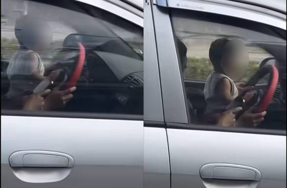 X&aacute;c minh clip để trẻ nhỏ ngồi trước v&ocirc; lăng khi l&aacute;i xe tại H&agrave; Nội, người mẹ ph&acirc;n trần l&yacute; do- Ảnh 1.