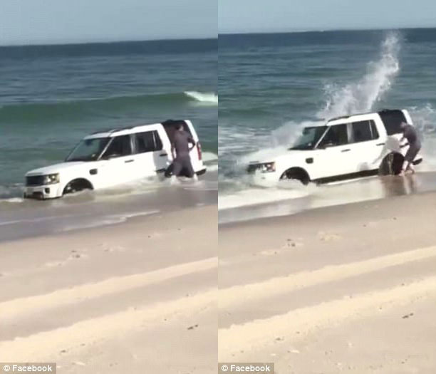 Đỗ trên bờ biển, SUV hạng sang Land Rover suýt bị sóng nhấn chìm - Ảnh 3.