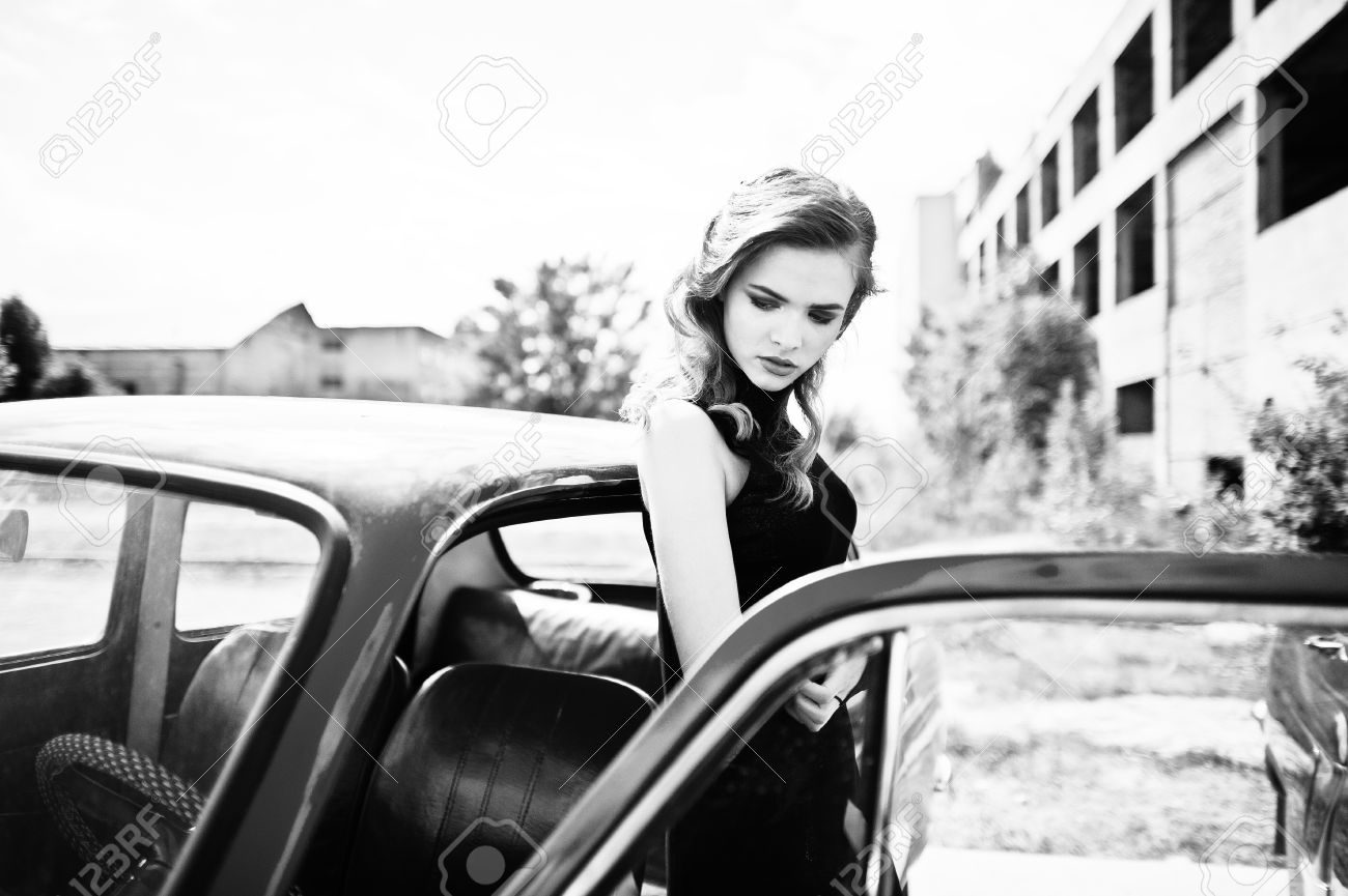 Glamorous girl beside vintage car - Image 4.