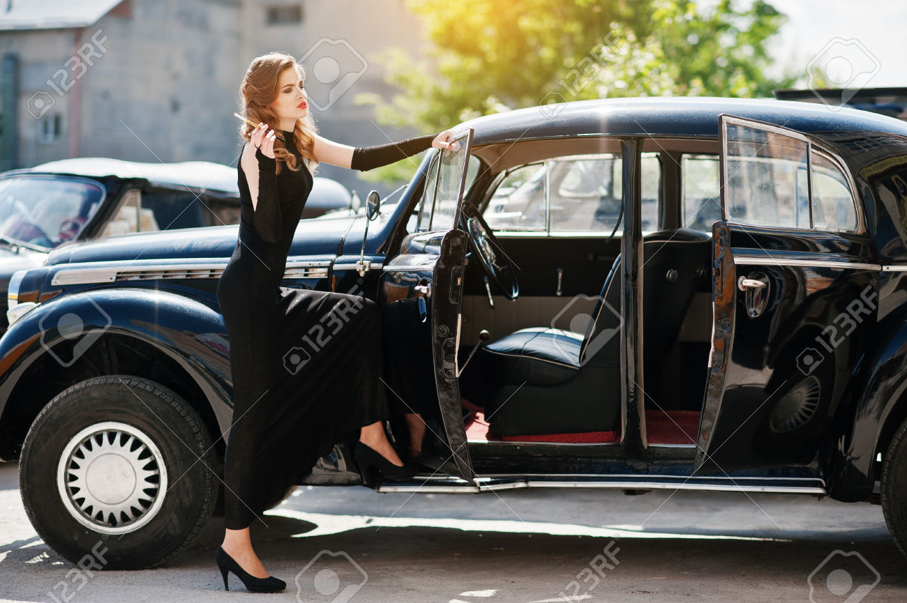 Glamorous girl beside vintage car - Image 6.