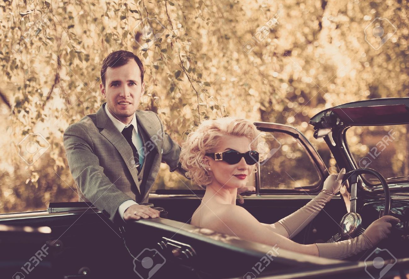 Sophisticated woman with classic car - Photo 3.