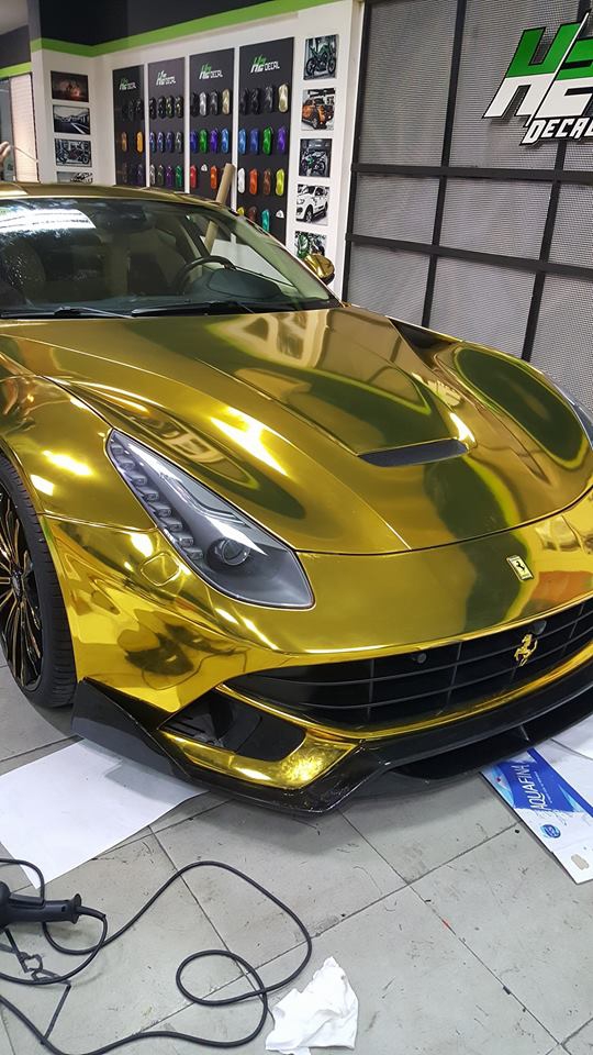 Ferrari F12 Berlinetta từng thuộc sở hữu của Cường Đô-la được mạ vàng tại Sài thành - Ảnh 2.