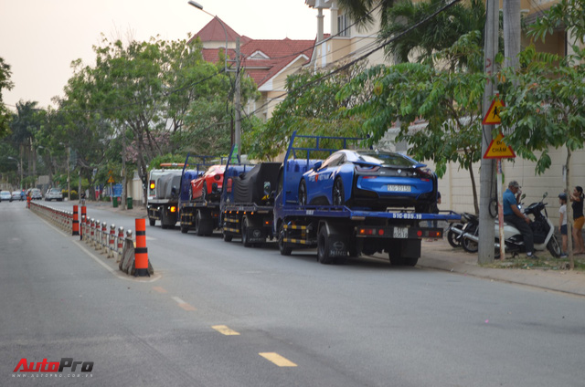 Đoàn siêu xe tại Sài Gòn bắt đầu lên xe chuyên dụng tiến về Hà Nội - Ảnh 14.