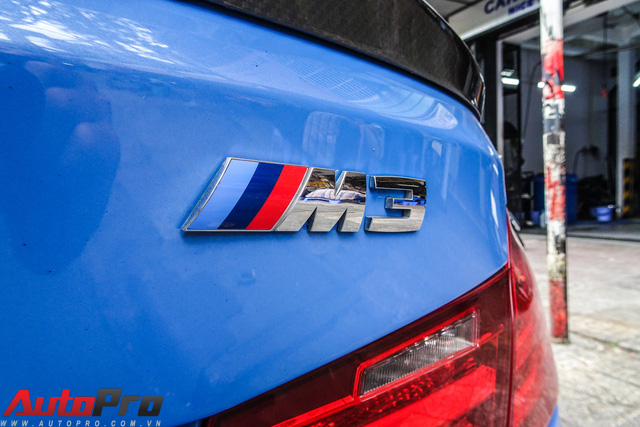 BMW M3 màu xanh Yas Marina độ carbon hàng độc lăn bánh trên phố Sài Gòn - Ảnh 3.