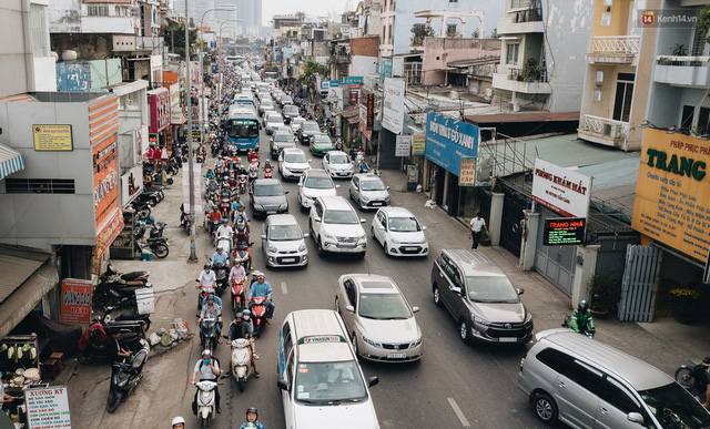 Chùm ảnh Flycam người dân ùn ùn đổ về quê ăn Tết, các ngả đường về bến xe lớn nhất Sài Gòn ùn tắc kinh hoàng - Ảnh 4.