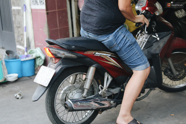 Dịch vụ giữ xe máy xuyên Tết cho người dân rời Sài Gòn về quê hốt tiền triệu mỗi ngày - Ảnh 3.