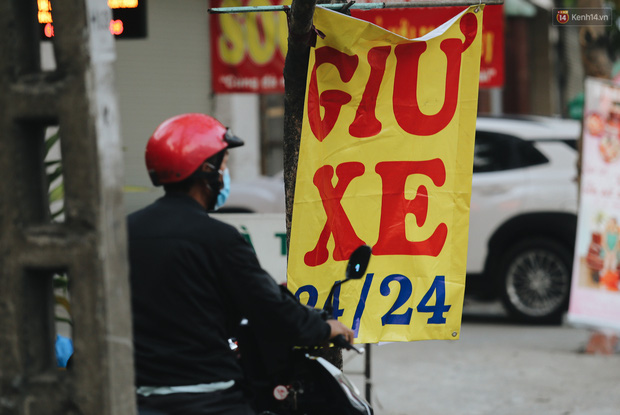 Dịch vụ giữ xe máy xuyên Tết cho người dân rời Sài Gòn về quê hốt tiền triệu mỗi ngày - Ảnh 5. Dịch vụ giữ xe máy xuyên Tết cho người dân rời Sài Gòn về quê hốt tiền triệu mỗi ngày - Ảnh 5.
