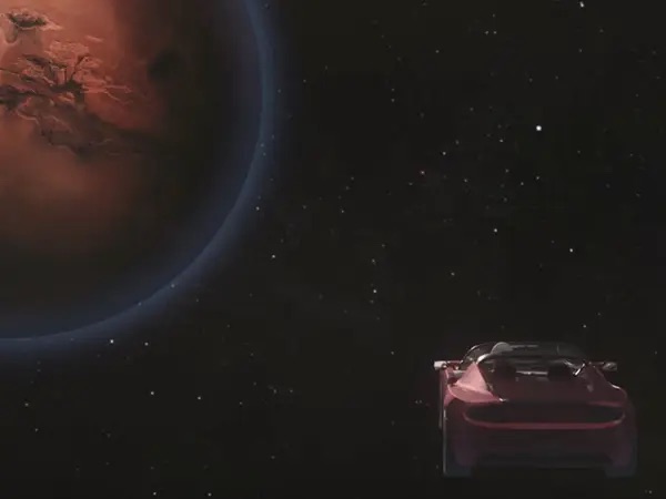 Chiếc Tesla Elon Musk phóng lên vũ trụ vừa bay ngang Sao Hoả lần đầu tiên sau 2 năm rời Trái đất - Ảnh 2.