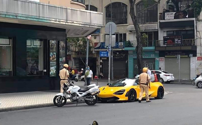 Siêu xe mui trần McLaren 720S Spider màu vàng ở Sài Gòn bị tạm giữ để chờ xác minh biển số - Ảnh 1.