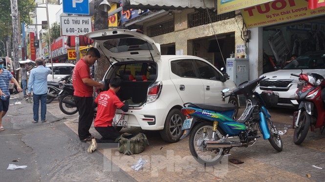 Người Sài Gòn tất bật tân trang xế cưng đón Tết - Ảnh 5.