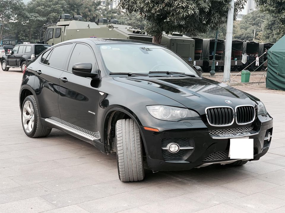 Khoe tên vợ bé nằm trong sách đỏ, chủ xe vẫn hạ giá BMW X6 rẻ ngang Kia Seltos 2021 - Ảnh 1.