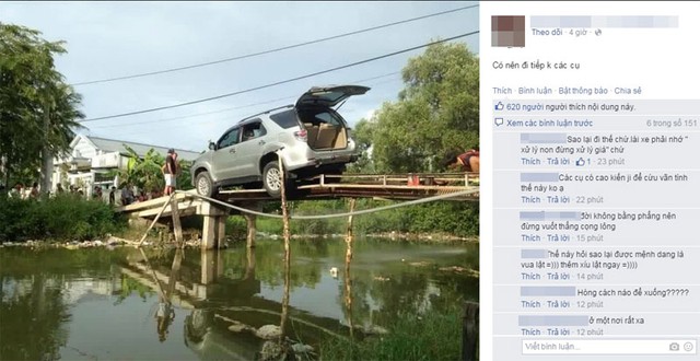 
Hình ảnh chiếc Toyota Fortuner chênh vênh trên cầu gây xôn xao mạng xã hội. Ảnh: Phương Nguyễn/Otofun
