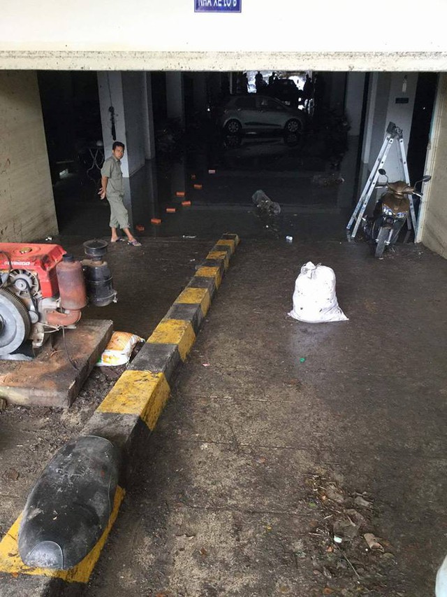 Mưa lớn kéo dài tại Bà Rịa - Vũng Tàu khiến hàng loạt ô tô chết đuối trong hầm chung cư - Ảnh 3.