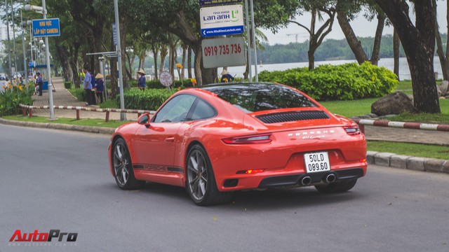Cường Đô la cùng dàn Porsche sắc màu tụ tập tại Sài Gòn - Ảnh 1.