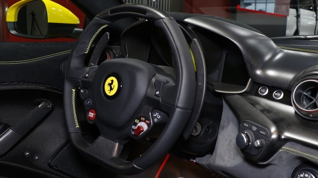 Giật mình với giá bán của chiếc Ferrari F12tdf tại đại lý bán Pagani Huayra cho Minh Nhựa - Ảnh 9.