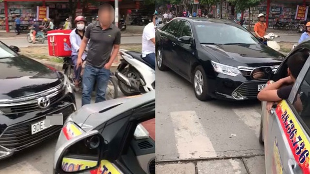 Hà Nội: Toyota Camry chạy lấn làn, bị xe taxi ép phải lùi lại