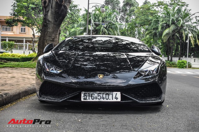 Lamborghini Huracan đen độc nhất Việt Nam của đại gia Bitcoin tái xuất trên phố Sài Gòn - Ảnh 4.