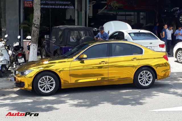 Kỳ công “dát vàng” phong cách dân chơi UAE cho chiếc BMW của chủ khách sạn tại Đà Nẵng - Ảnh 1.