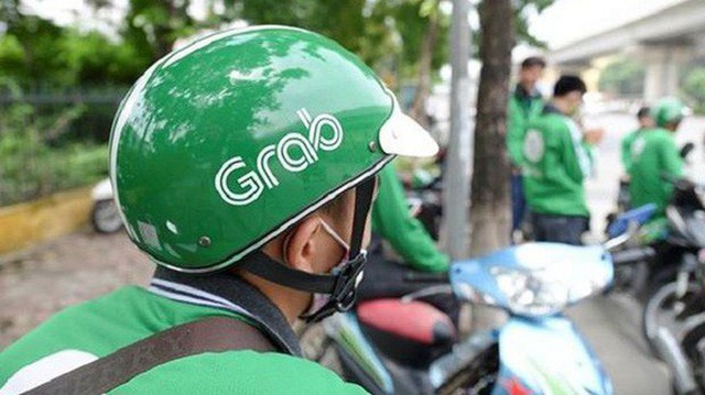 Grab tăng giá cước sau khi thâu tóm Uber