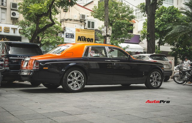 Chiếc Rolls-Royce Phantom tại Hà Nội đổi màu nhanh như tắc kè: Vừa hết tím mộng mơ lại đến cam cá tính - Ảnh 6.