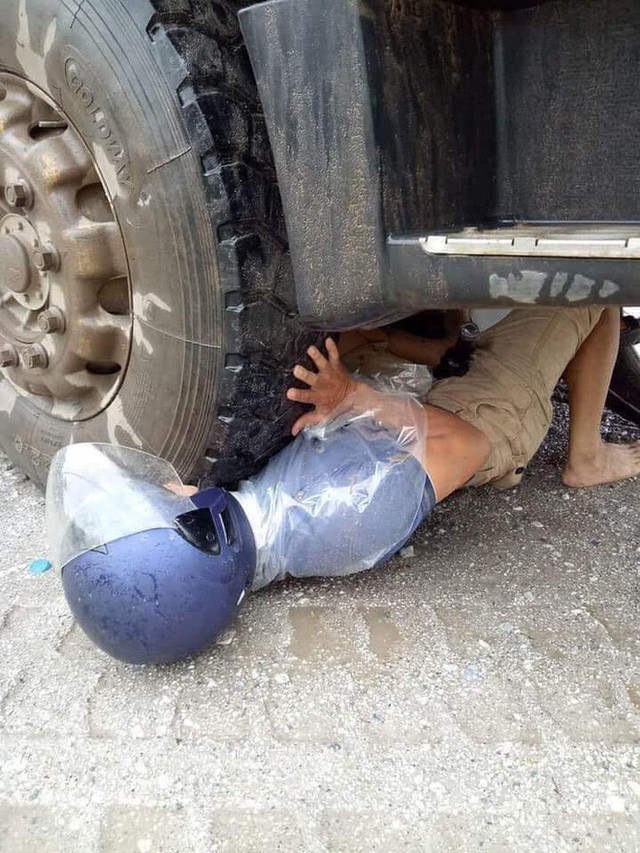Yên Bái: Người đàn ông mắc kẹt dưới bánh xe container và 1 giây may mắn đến khó tin - Ảnh 3.