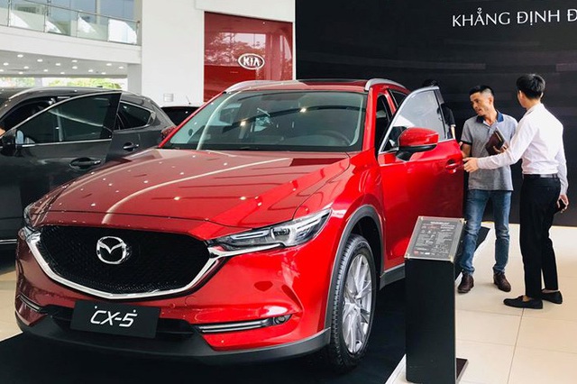 Sau lần giảm giá sốc, loạt xe Mazda thêm khuyến mãi mạnh tay tại Việt Nam, quyết giành lại vị thế trên thị trường - Ảnh 2.