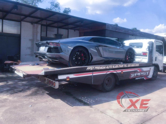 Phát đạt ở Lào, đại gia Việt mang siêu xe Lamborghini Aventador về quê ăn Tết - Ảnh 1.