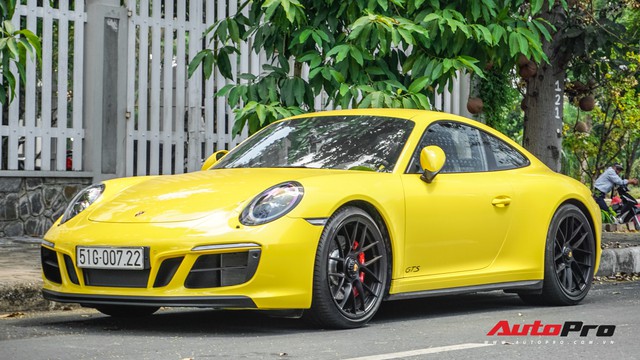Porsche 911 Carrera GTS màu vàng 8,11 tỷ đồng của dân chơi Sài Thành - Ảnh 1.