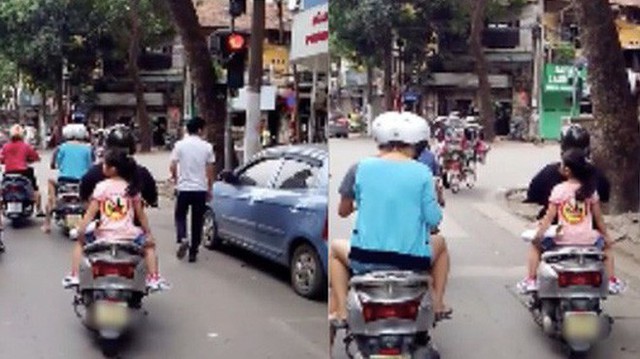 Clip: Mẹ dán logo “đã uống rượu bia, không lái xe” rồi chở con gái đầu trần vượt đèn đỏ trên đường phố Hà Nội khiến nhiều người bức xúc