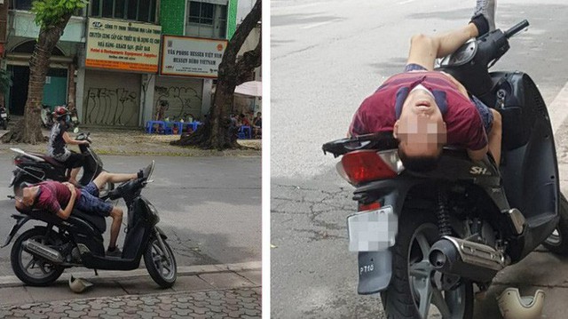 Người đàn ông nằm trên xe SH với tư thế kỳ lạ giữa đường khiến nhiều người chú ý