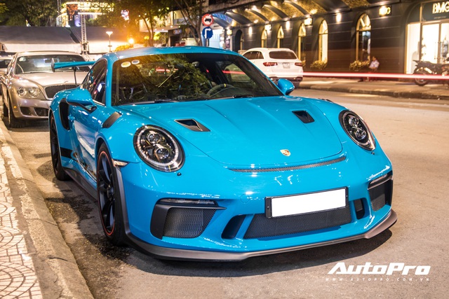 Đại gia Việt tậu pô hàng hiệu cho Porsche 911 GT3 RS Miami Blue độc nhất Việt Nam - Ảnh 1.